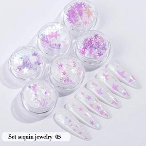 Detailed holographic star nail sequins in six small jars for professional manicure set