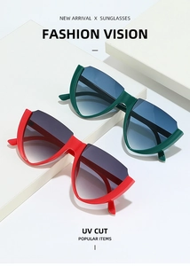 Detailed macro view of trendy V-shaped cat-eye sunglasses with colorful gradient lenses