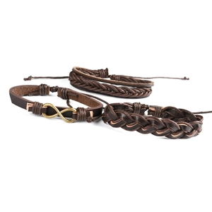 Three-piece brown leather braided bracelet set with bronze infinity symbol charm
