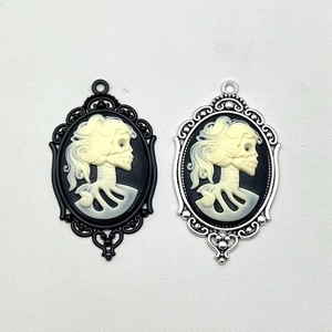 Gothic skull cameo pendants in black and silver oval frames for Halloween DIY jewelry