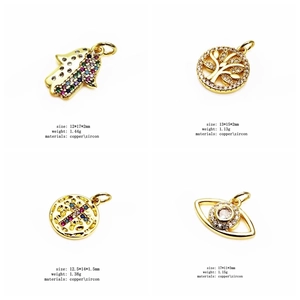Detailed views of gold copper zircon Hamsa, Tree of Life, Cross, and Evil Eye charms
