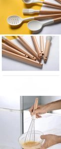 Detailed view of cream silicone utensils with ergonomic wooden handles and hanging holes