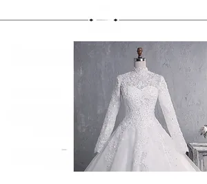 Detail of high neck lace bridal gown featuring intricate beading and long sleeves