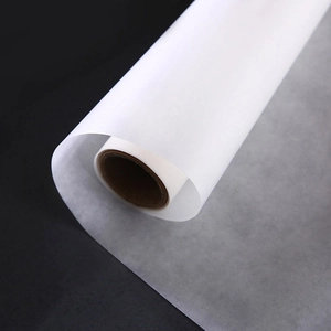 Roll of white double-sided silicone baking paper for oven cooking and pastry use