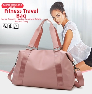 Detail of waterproof pink gym bag with large capacity and reinforced shoulder strap