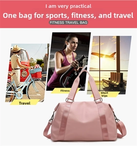 Pink waterproof duffel bag showing versatile handles and a detachable shoulder strap