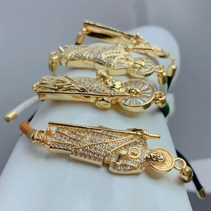 Adjustable religious St. Jude hand bracelet with micro-pave zircons and woven cord