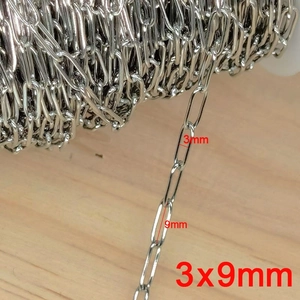 Macro detail of 3x9mm stainless steel cable chain links for DIY jewelry making