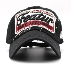 Close-up of vintage embroidery with 'Limited Edition' text on black baseball cap