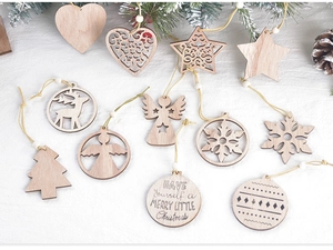 Detailed close-up of assorted laser-cut wooden Christmas ornaments with festive jute strings