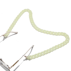 Close-up of light green acrylic eyeglass chain with large frosted link design