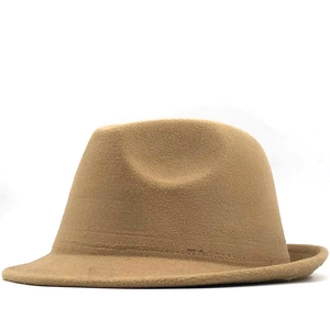 Detail view of camel wool fedora hat with clean stitching and classic indented crown