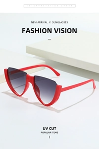 Detail view of red semi-rimless V-shaped cat eye sunglasses with UV protection lenses