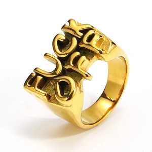 Macro shot of gold hip-hop ring featuring 3D embossed FUCK LOVE lettering design