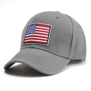 Classic grey baseball cap with embroidered American flag patch on a six-panel cotton crown
