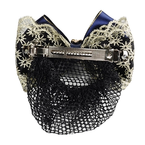 Rear view of navy blue nurse bow hair clip with gold lace and black snood net