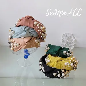 Knotted wide headbands with faux pearls and fabric texture in multiple colors