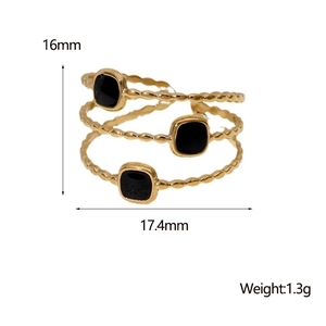 Detailed size specifications for the gold multi-layer geometric ring with black accents