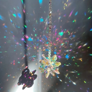 AB colorful crystal flower suncatcher with prism ball creating vibrant rainbow light