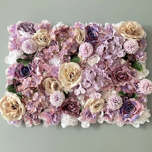 Detailed macro view of artificial hydrangea and rose flower wall panel in purple and pink