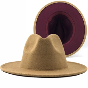 Detail of camel fedora hat with burgundy inner lining and premium wool felt texture
