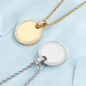 Polished titanium steel round pendant necklaces in gold and silver with CZ stone inlay