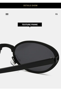 Detailed macro view of the oval sunglasses texture frame and robust metal hinge joint