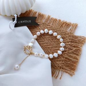 Detail of baroque freshwater pearl bracelet with 14K gold-plated OT toggle clasp