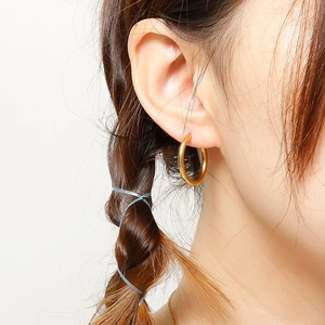 Minimalist gold hoop earrings in polished titanium steel for men and women