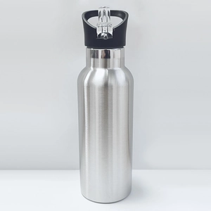 Macro detail of silver stainless steel water bottle with black lid and clear straw