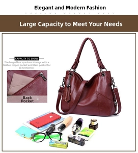 Deep red leather tote bag showing large capacity for phone and cosmetics with side tassel