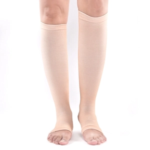 Flesh-colored long compression socks for men with open-toe design and breathable knit fabric