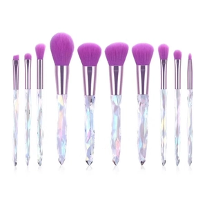 Detail of 10-piece makeup brush set featuring purple bristles and diamond crystal handles