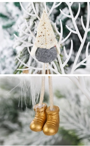 Detail of sequined knit hat and gold boots on a faceless Christmas gnome doll