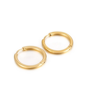 Polished gold stainless steel hoop earrings for men and women on a white background