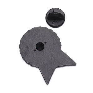 Detail of creative alloy medal brooch back with black rubber clutch and dual pins