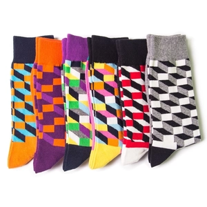 Set of six colorful cotton socks featuring geometric patterns and striped designs