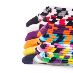 Vibrant geometric diamond and striped patterned cotton crew socks for men in colorful stacks