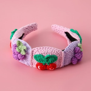 Handmade crochet fruit bunny headband with cherry and grape knit patterns in pink and purple