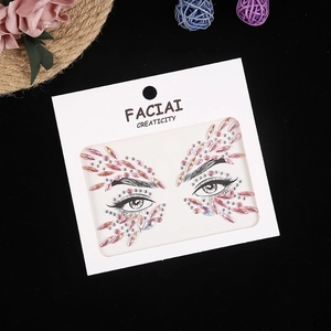Detailed view of pink gradient face jewel stickers with acrylic teardrop gems