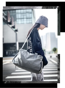 Large gray travel duffel bag for sports and fitness with separate shoe compartment