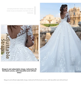Detailed corset back of a white lace wedding dress with adjustable lacing and long train