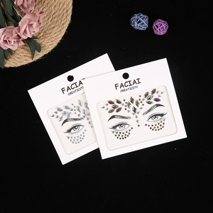 Face jewel stickers with iridescent rhinestones for music festivals on black background