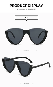 Front and side view showing the black cat-eye semi-rimless frame and dark gray lenses