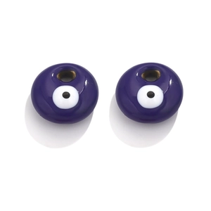 Detailed macro shot of flat blue Evil Eye resin beads for DIY earring jewelry making