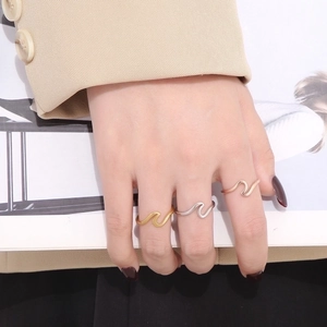 Minimalist wave stainless steel rings for women in gold, silver and rose gold stacked style