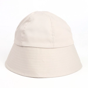 Detailed view of the beige cotton twill bucket hat with neat stitching and dome design