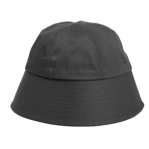 Detailed close-up of parallel stitching on a black cotton bucket hat with canvas texture