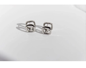 Detailed view of silver hollow square earrings with minimalist geometric double-layer design