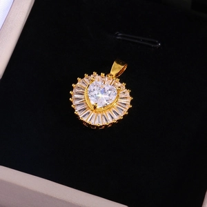 Exquisite gold snake chain necklace featuring a zircon heart pendant in a jewelry gift box